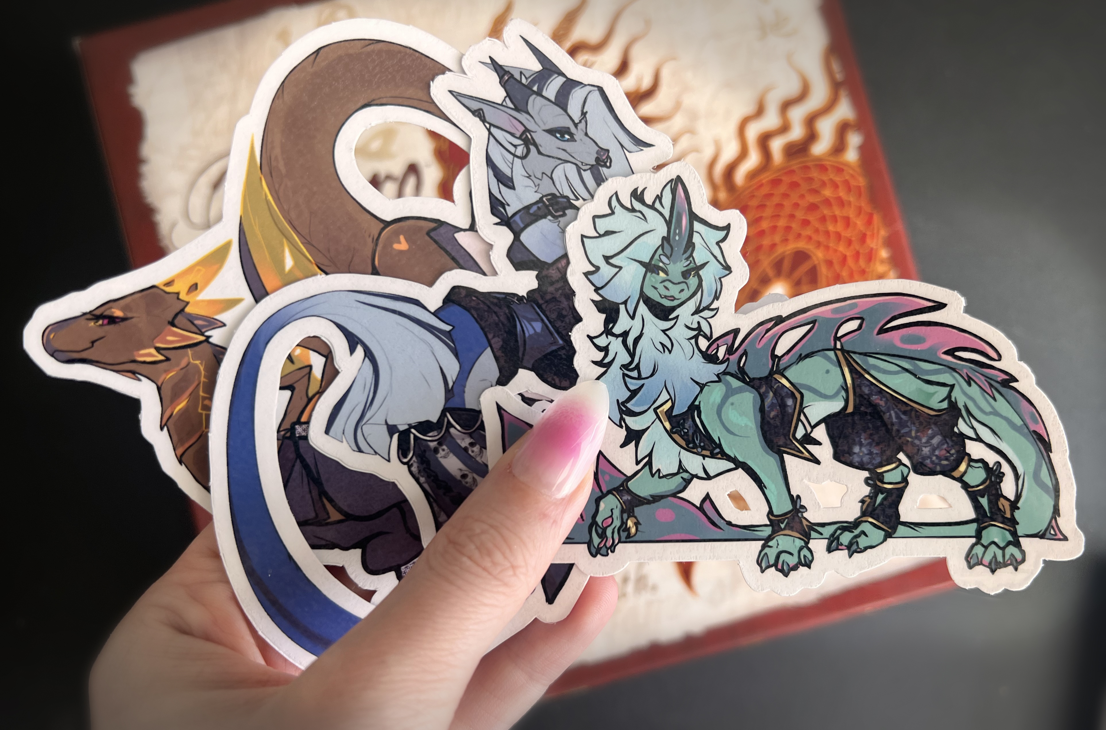three glossy vinyl stickers of eastern dragons